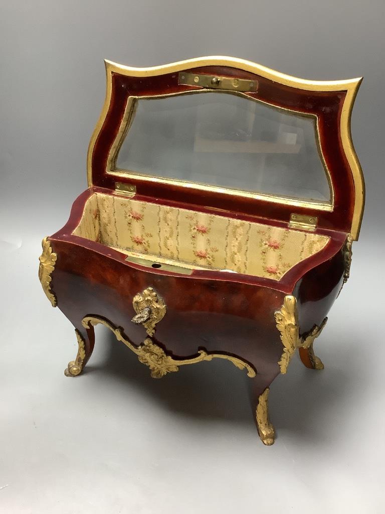 A tortoiseshell and ormolu jewellery casket, modelled in the form of a French commode and a Victorian brass-mounted walnut tea caddy, largest 31cm